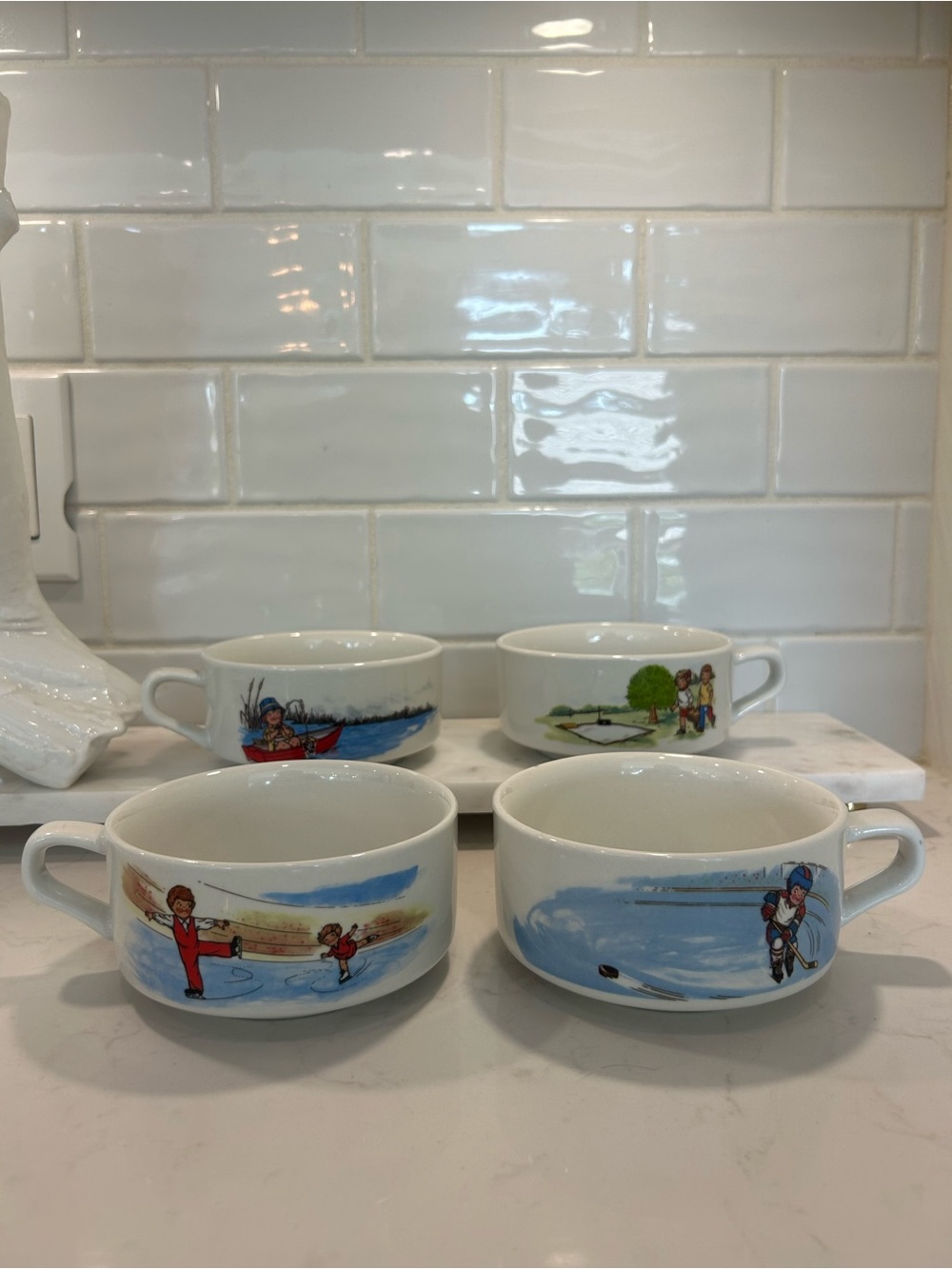 Set of four Vintage Iconic Campbell’s Kids handled soup bowls from the 1980s.